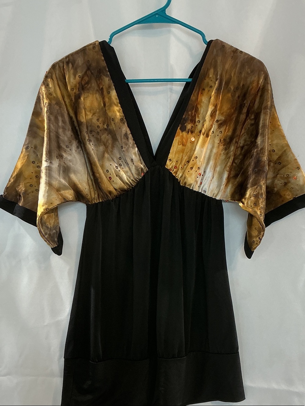 Black Tunic with Metallic Gold-Print Capelet